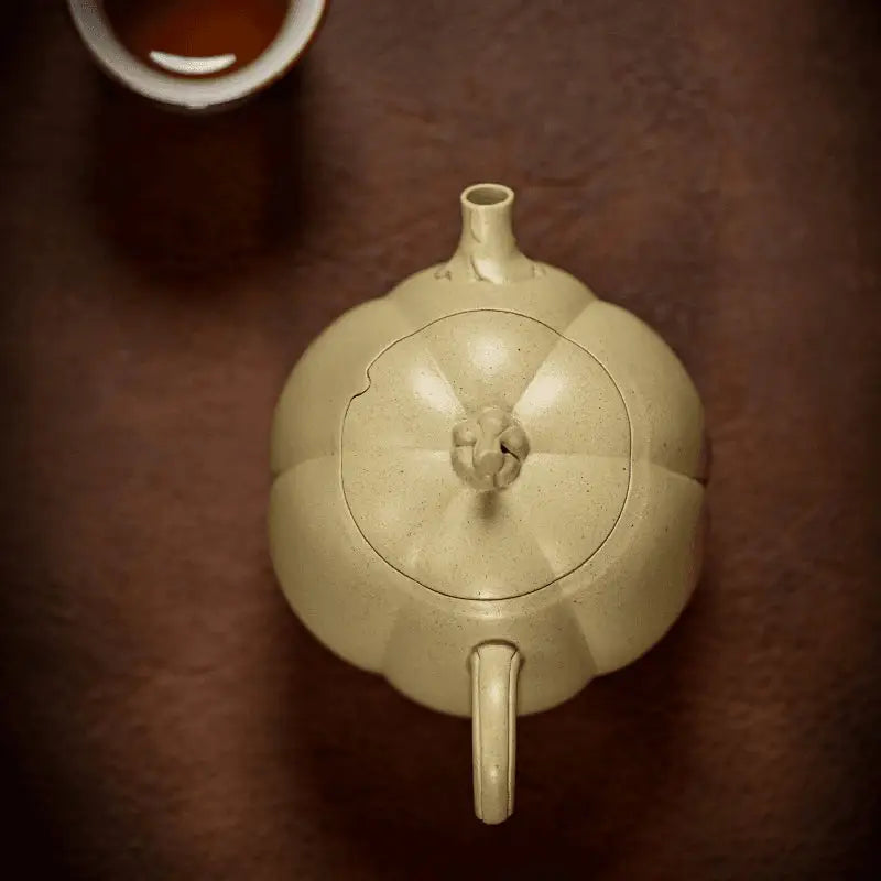 Ceramic Pumpkin-Shaped Teapot made of Yixing Duanni Clay showcasing Golden Gourd design