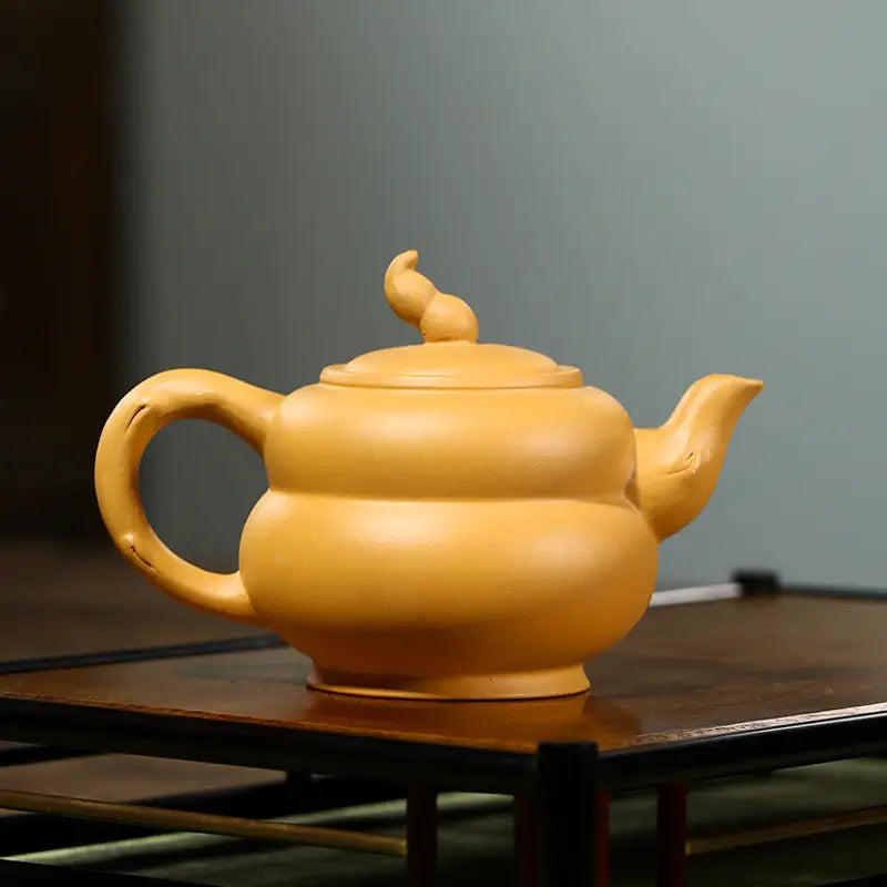 Yellow ceramic teapot from Golden Gourd made of Yixing Zisha duanni clay for Gongfu tea