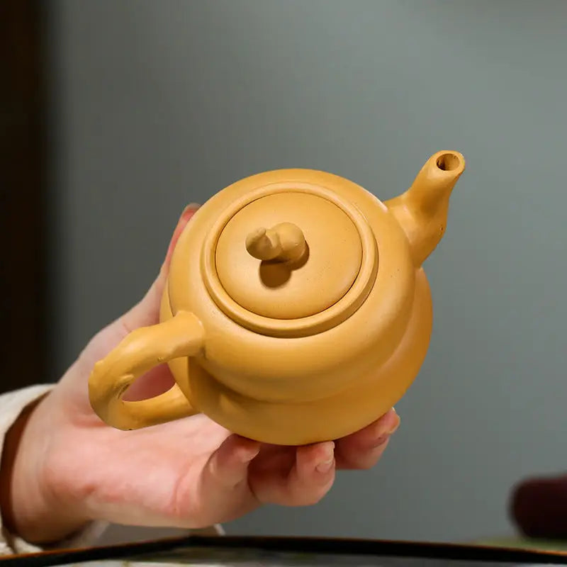 Yellow ceramic teapot from Golden Gourd, perfect for Gongfu tea with Yixing Zisha or Duanni clay