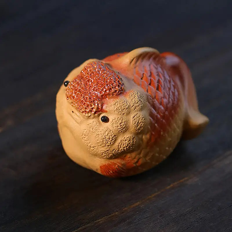 Ceramic Lionhead Goldfish Tea Pet figurine from Golden Guardian collection
