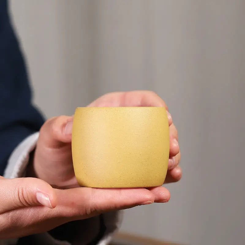 Yellow Duanni clay ceramic cup from Golden Harmony collection by Yixing Zisha