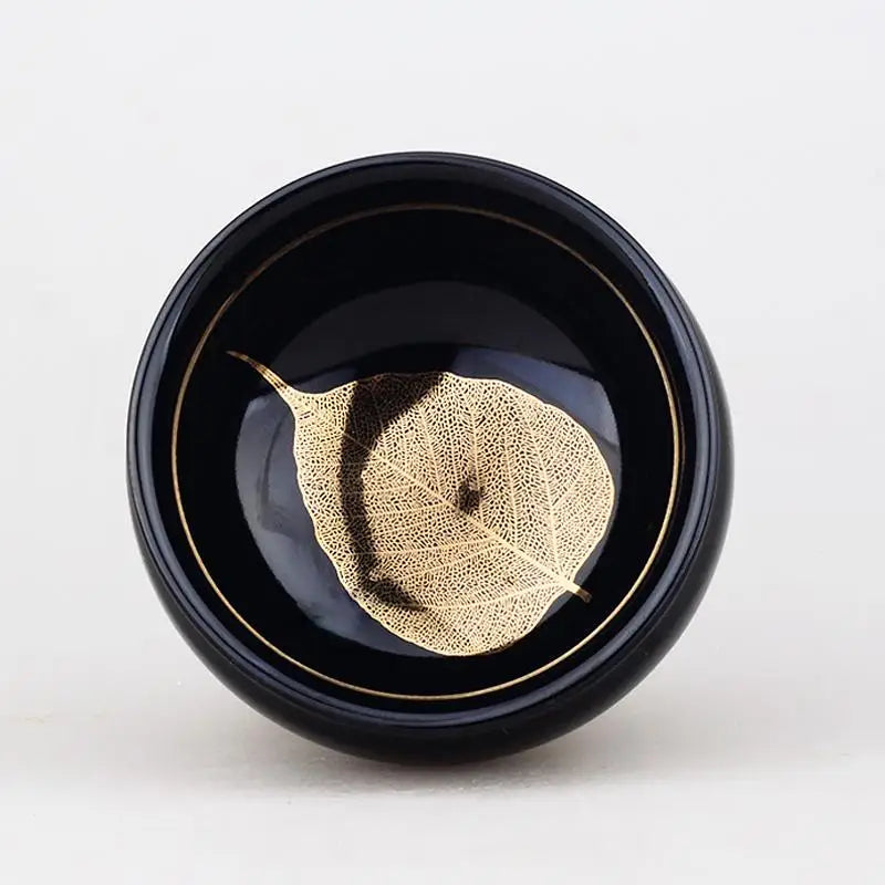 Black bowl with real gold leaf design by Jian Zhan for Tenmoku tea serving