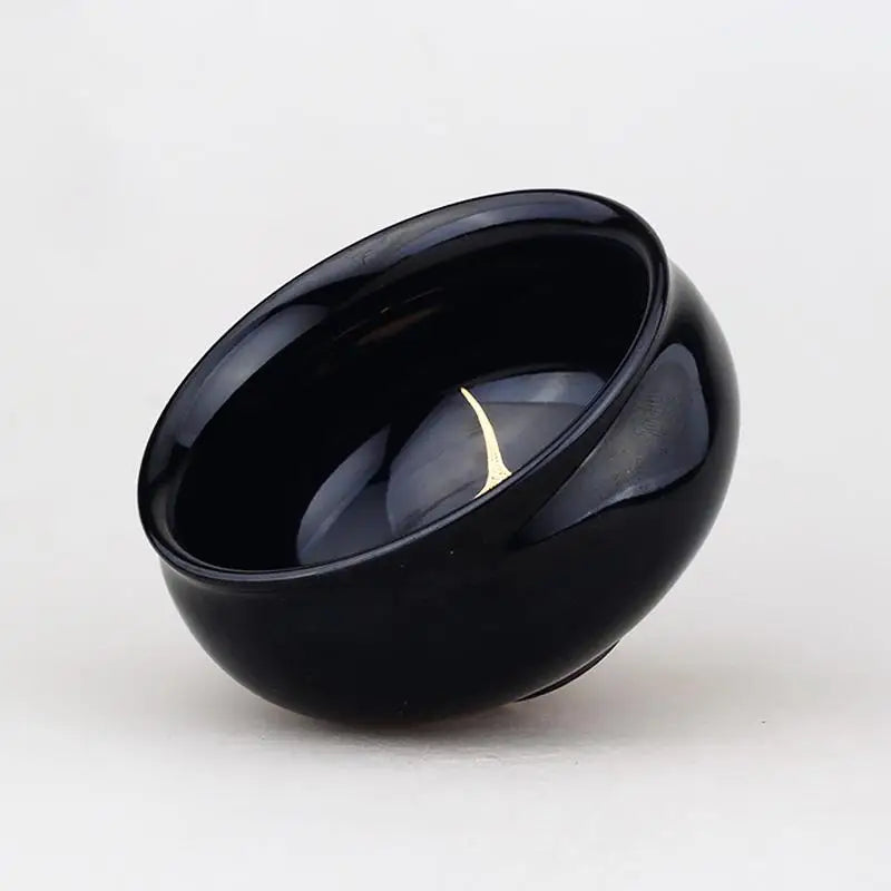 Glossy black bowl from Golden Leaf featuring real gold leaf for Jian Zhan Tenmoku tea