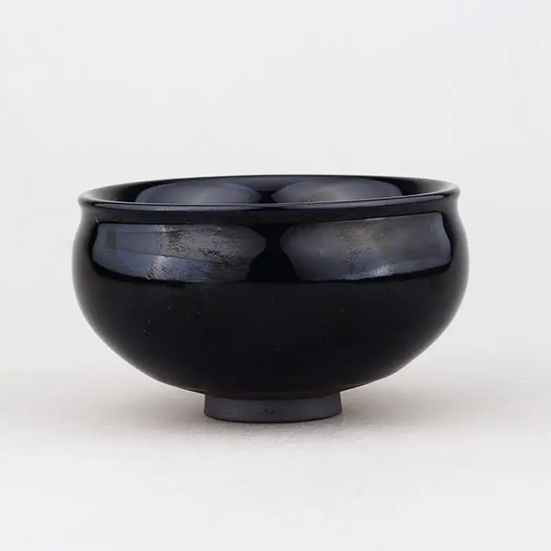 Glossy black ceramic bowl with real gold leaf from Golden Leaf, ideal for Jian Zhan and Tenmoku tea