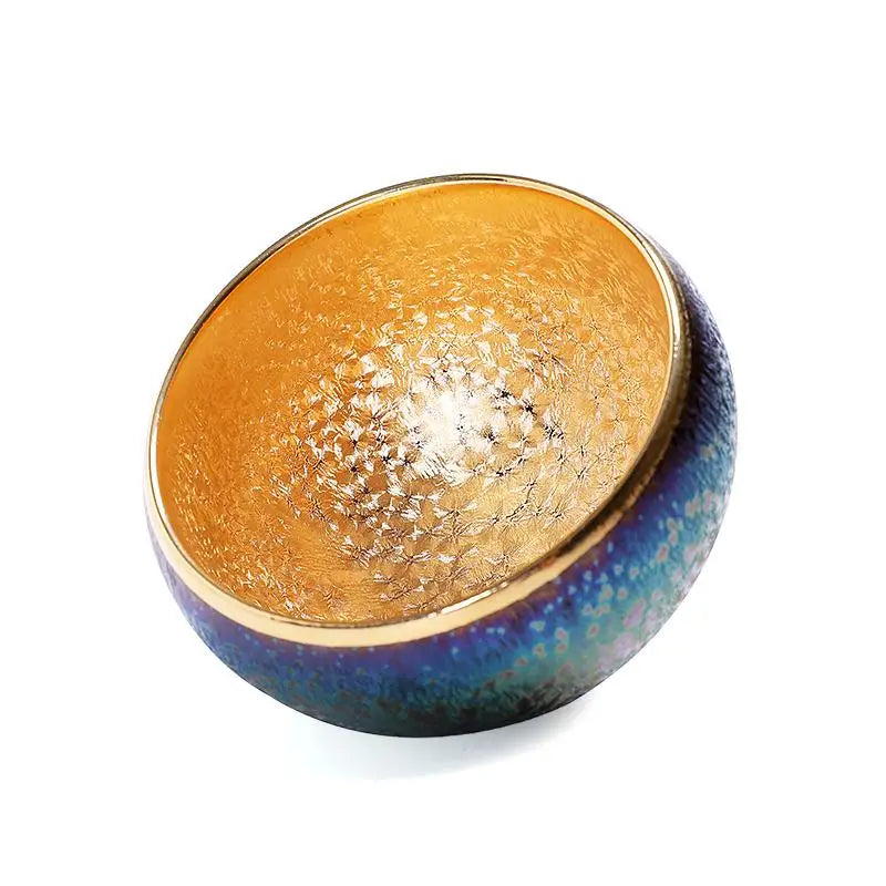 Iridescent blue and gold decorative bowl from Golden Magic featuring Jian Zhan tea design