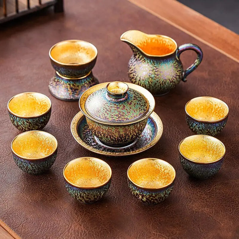 Ceramic Golden Magic Tea Set with iridescent glaze and gold interiors, perfect for magic tea rituals