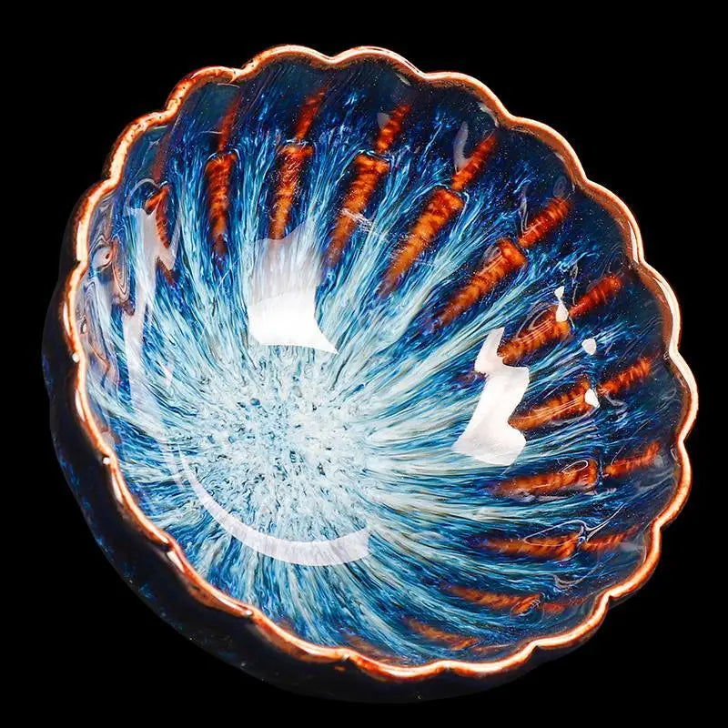 Decorative blue and orange ceramic bowl from Golden Peacock Tenmoku Zhan Tea collection