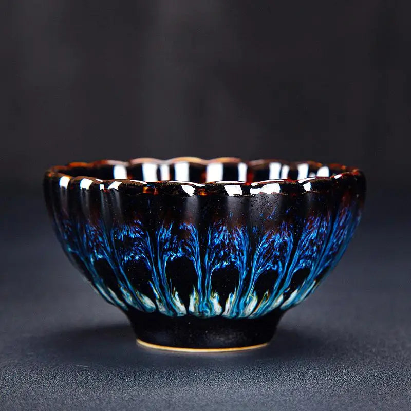 Ornate blue and brown ceramic bowl from Golden Peacock Tenmoku Jian Zhan Tea Cup collection