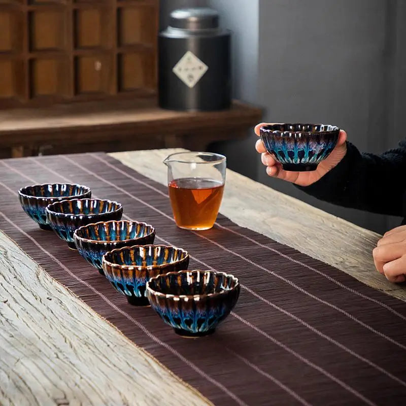 Set of iridescent tea cups from Golden Peacock featuring Tenmoku Jian Zhan Zhan Tea style