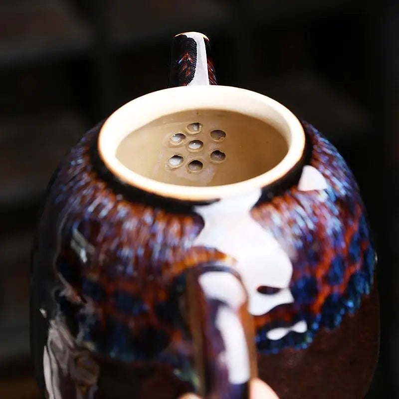 Golden Peacock Jian Zhan Teapot with oil-spot glaze and internal strainer