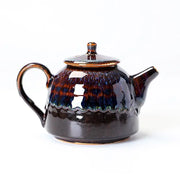 Glossy brown and blue ceramic Golden Peacock Jian Zhan Teapot with oil-spot glaze