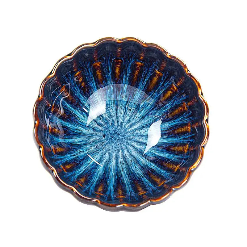 Blue and brown ceramic bowl from Golden Peacock Tenmoku Jian Zhan Tea Cup collection