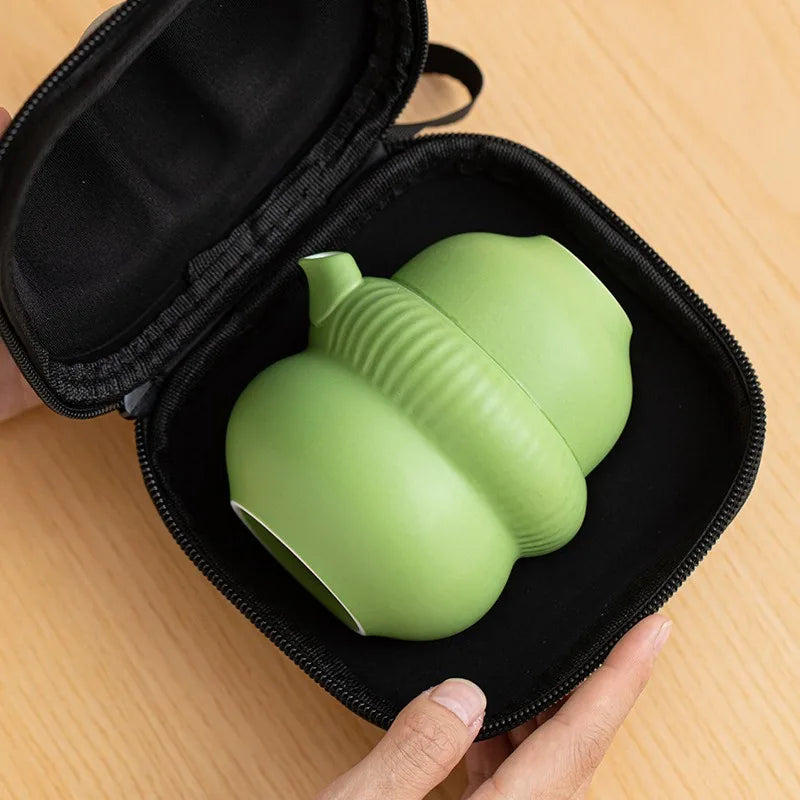 Gourd-shaped porcelain kuaike travel tea set with two cups and padded zip case – photo 2