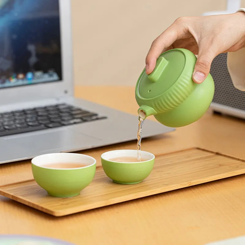 Gourd-shaped porcelain kuaike travel tea set with two cups and padded zip case – photo 4