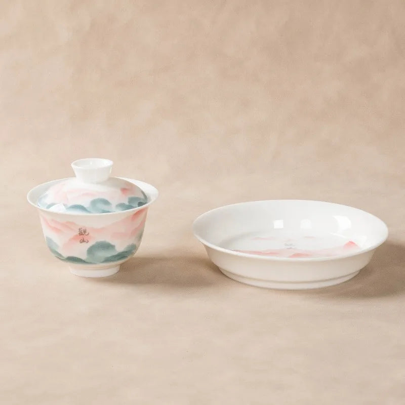 Jade-white gaiwan with pink and teal famille rose mountain landscape – photo 2
