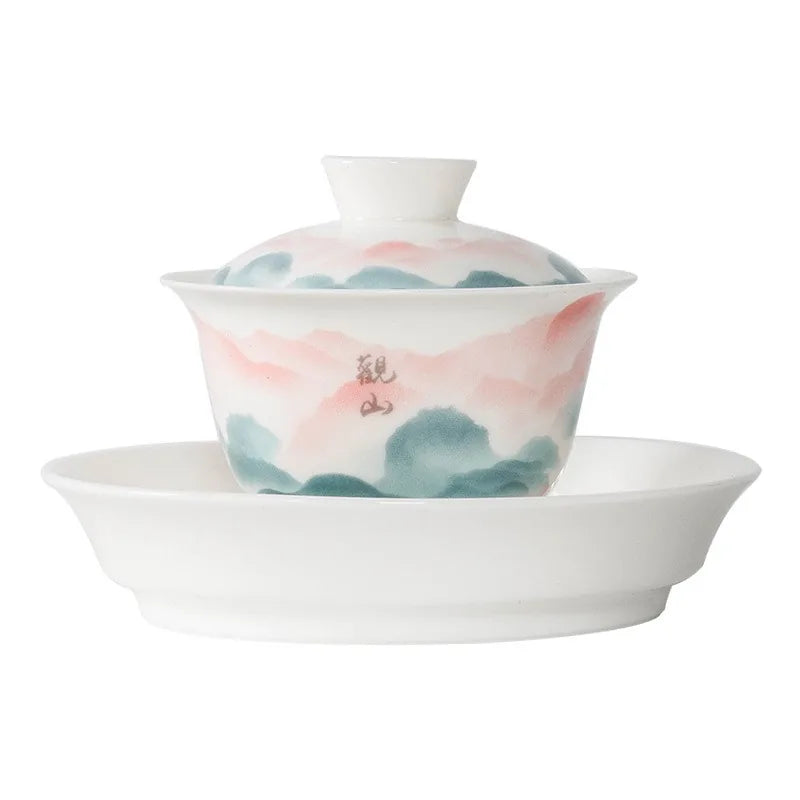 Jade-white gaiwan with pink and teal famille rose mountain landscape – photo 5