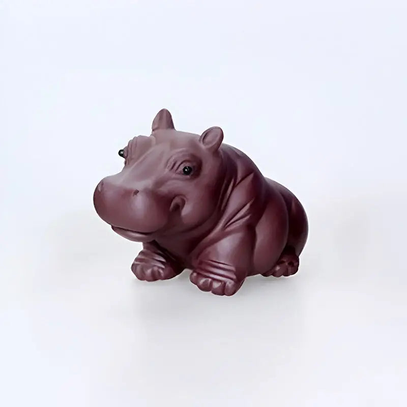 Maroon hippopotamus tea pet figurine from Guardian of Still Waters Yixing clay tea set