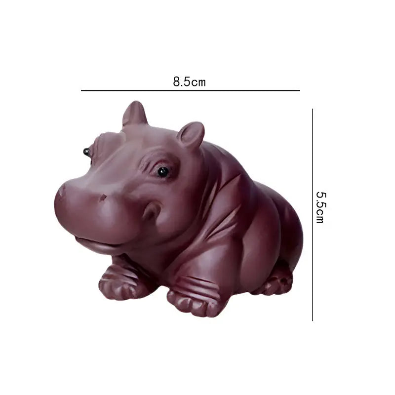 Maroon hippopotamus tea pet figurine from Guardian of Still Waters Yixing clay tea feng shui pets guide