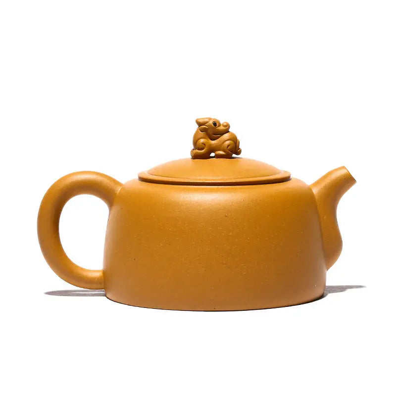 Yellow-brown Yixing Teapot with guardian beast lid in golden duanni clay