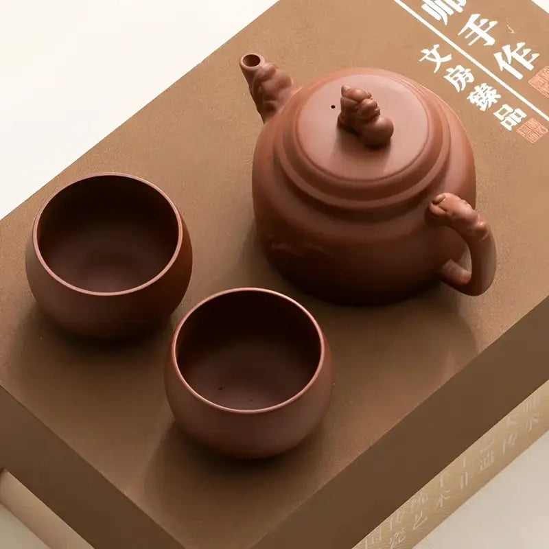Brown clay Guardian Spirit Tea Set with handcrafted Yixing Zisha teapot and cups