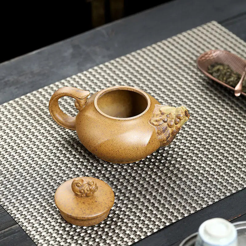 Earthenware Guardian Spirit Yixing Teapot with Dragon Spout and Lion Head Design