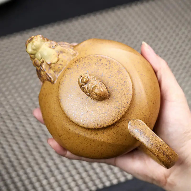 Round brown Yixing teapot with dragon ornamentation and lion head spout Guardian Spirit