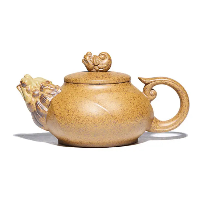 Ornate tan Yixing teapot with lion head spout made from Duanni clay in Guardian Spirit collection