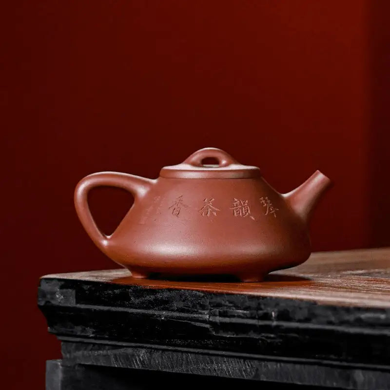 Yixing Zisha Teapot from Guqin Reverie with handle and spout for authentic zisha tea brewing
