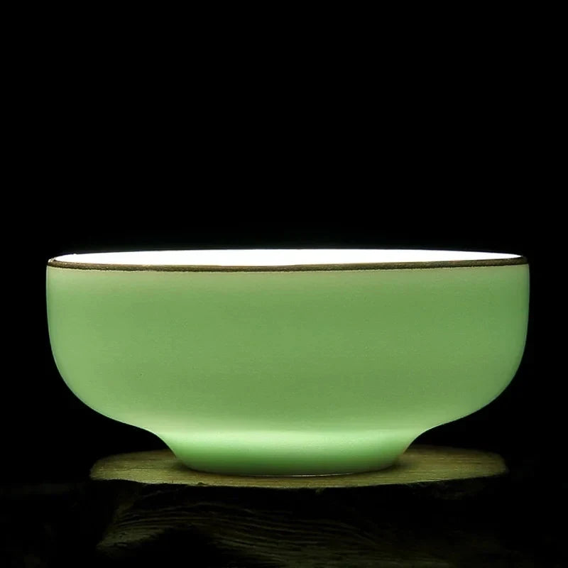 Hand-painted Celadon Lotus Tea Cup white background product photo