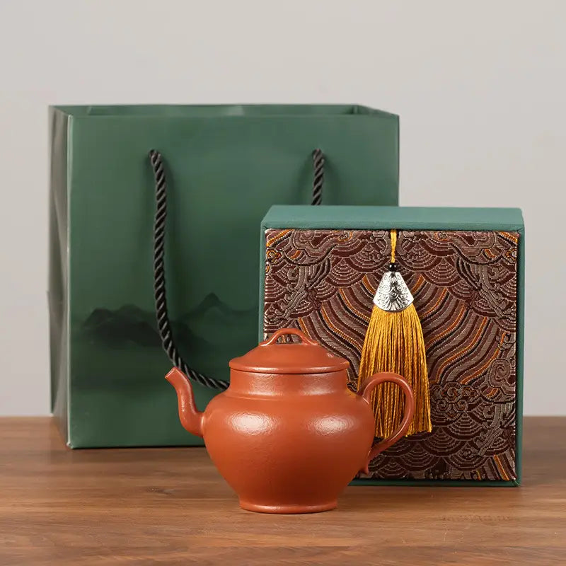 Harmony Ember gift set featuring an earthenware Yixing teapot with lid