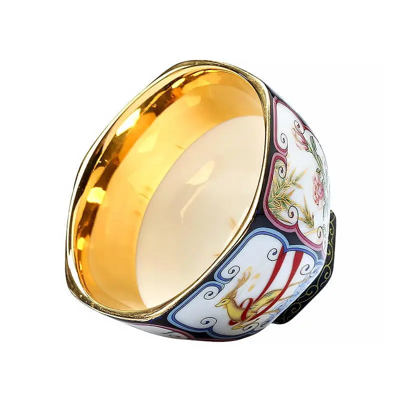 Gilded interior ornate gold-lined bangle from the Harmony collection featuring intricate design