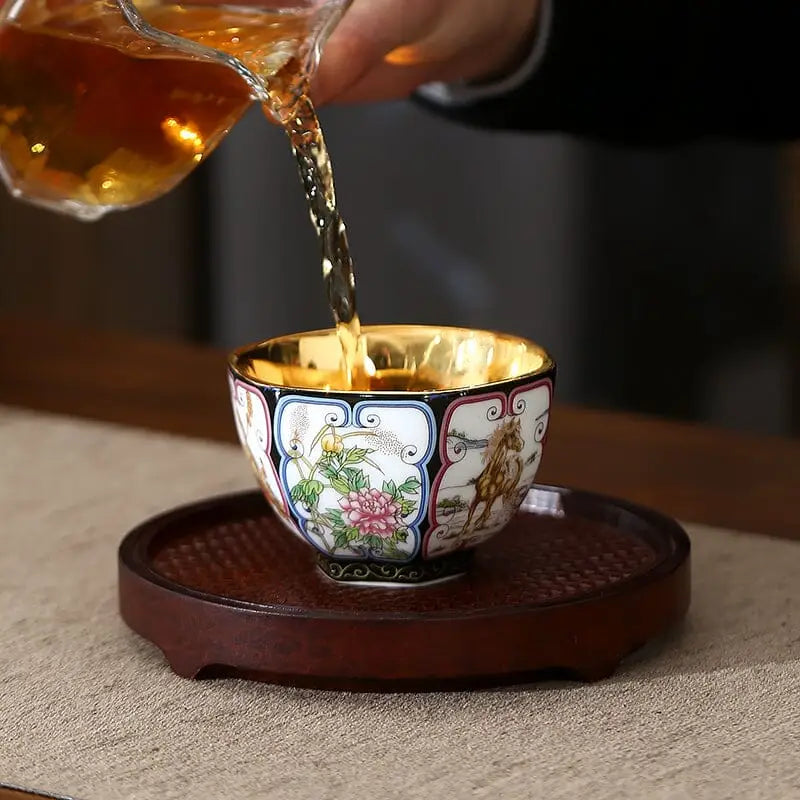 Ornate tea cup with gilded interior from the Harmony tea set, perfect for elegant teapots and tea sets