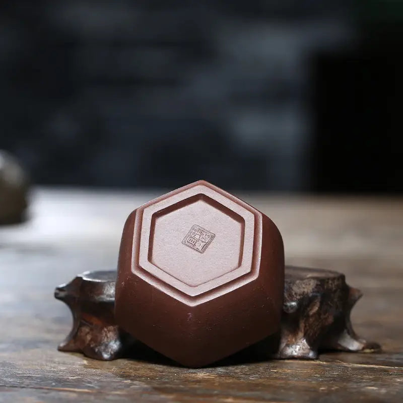 Hexagonal brown ceramic cup from HexaGrace for authentic purple clay gongfu tea brewing