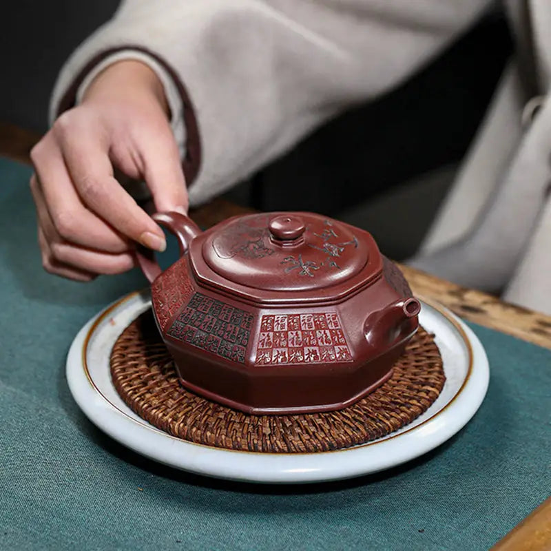 Octagonal brown teapot from HexaSeal Yixing with Chinese seal script design