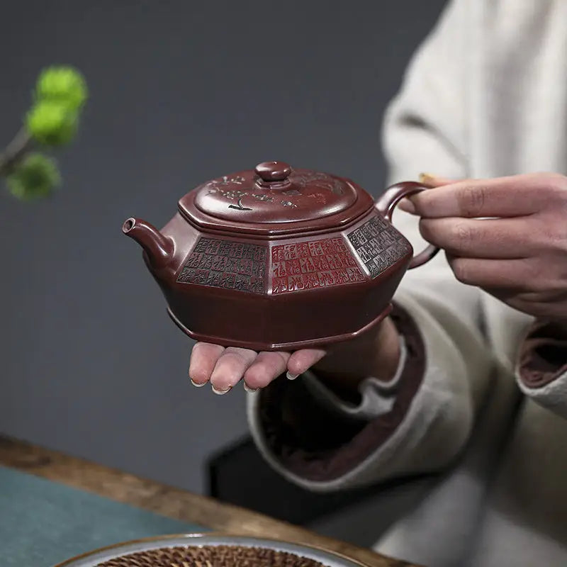 Octagonal brown teapot in HexaSeal Yixing style with Chinese seal script design