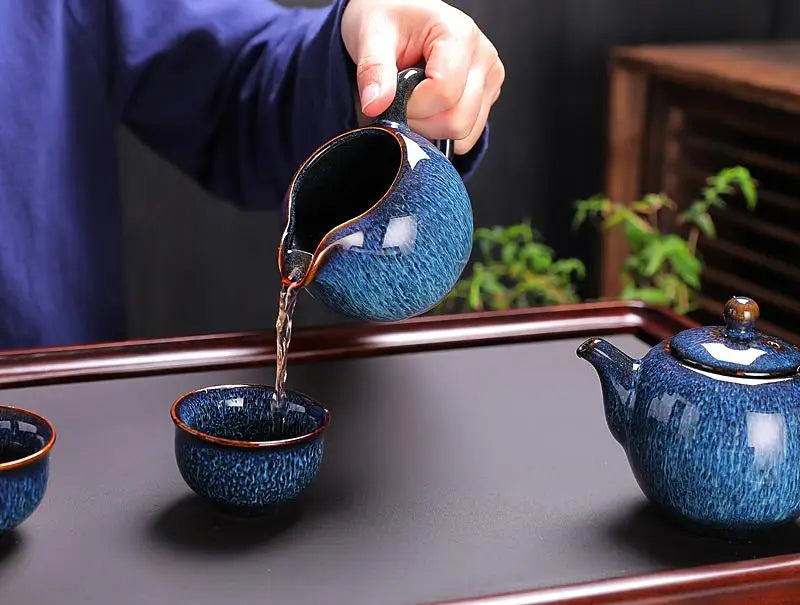 Blue ceramic Iceberg Tea Set featuring handcrafted Jian Zhan teaware for elegant brewing