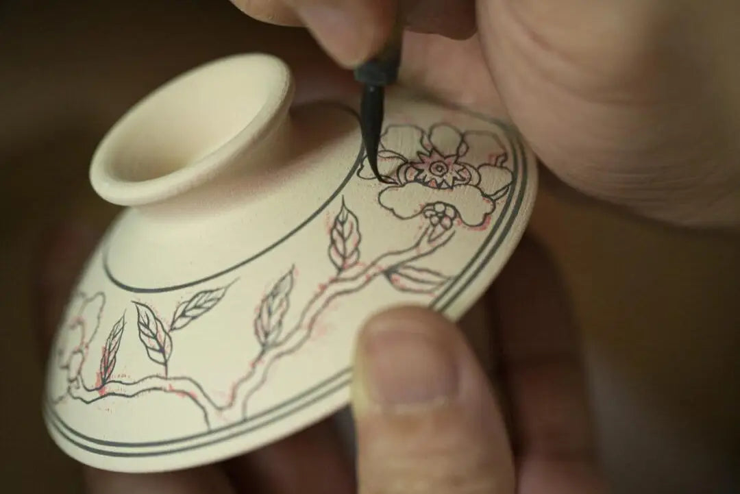 Hand-painted ceramic lid for Yixing teapots made from Zisha clay in Chinese tea craftsmanship