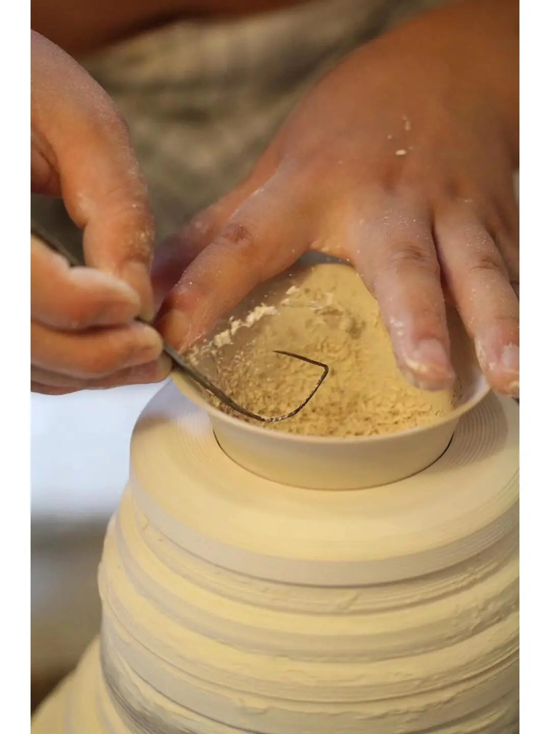 Dehua porcelain pottery trimming process showcasing Chinese ceramic craftsmanship from Fujian Province