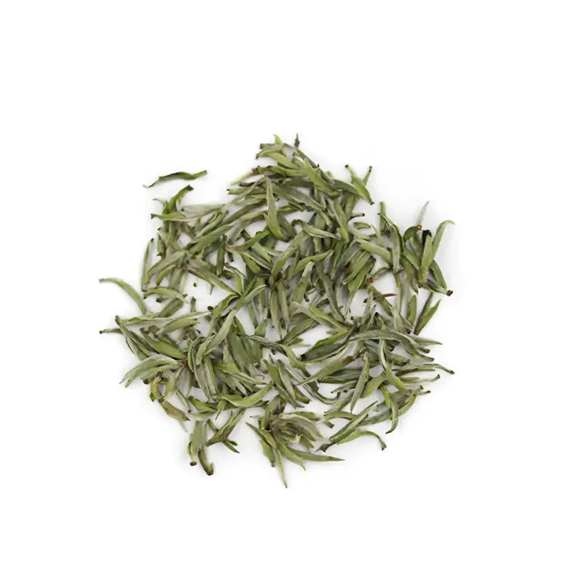 Pile of dried silvery-green white tea leaves from Imperial Baihao Yinzhen 2025