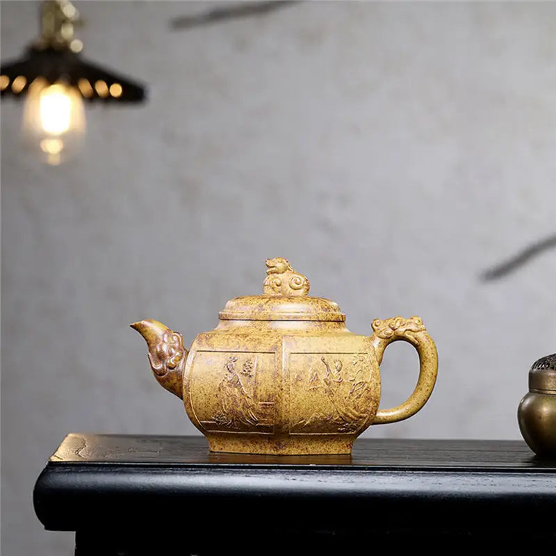 Ornate tan Yixing Duanni teapot with dragon handle from Imperial Gate collection