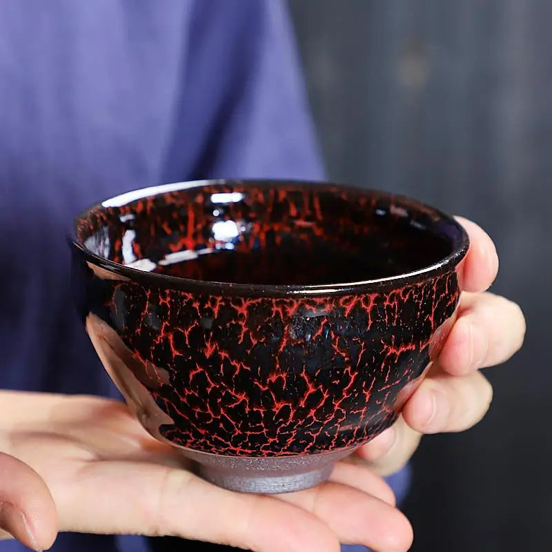 Red-crackle glazed Zhan tea cup from Inferno Jian Zhan with striking red flame glaze