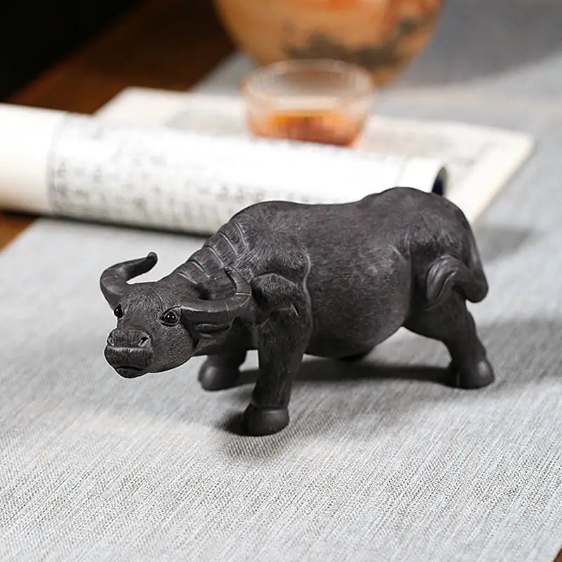 Dark sculpted water buffalo Ironhoof Guardian tea pet for water buffalo tea enthusiasts