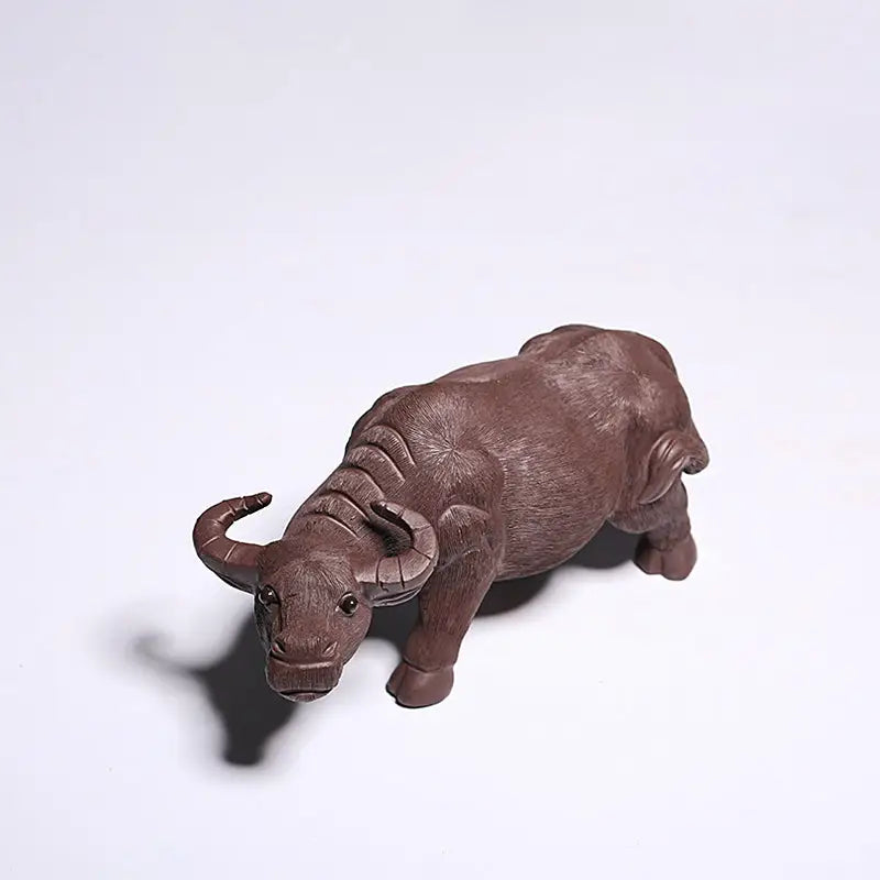 Brown water buffalo figurine from Ironhoof Guardian tea pet guide for water buffalo tea enthusiasts
