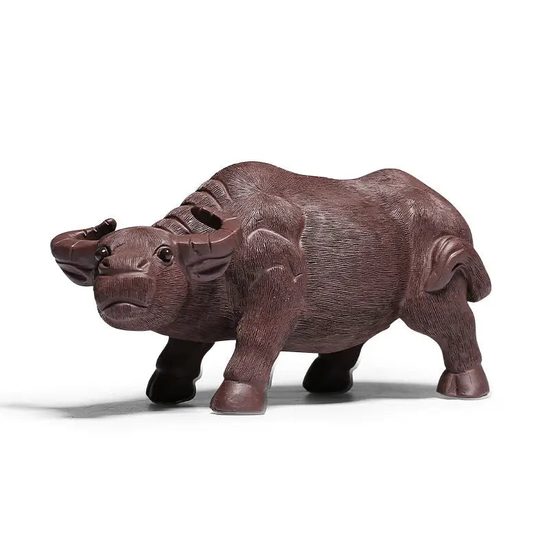 Brown water buffalo figurine from Ironhoof Guardian tea pet guide, perfect for water buffalo tea enthusiasts