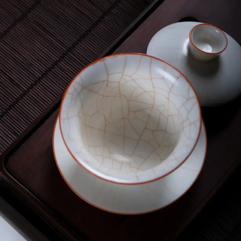 Cracked glaze tea set in Ivory White Ru Kiln with dehua porcelain and natural agate glaze