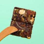 Compressed block of Jasmine White Tea Leaves ideal for teapots, tea sets, and mugs