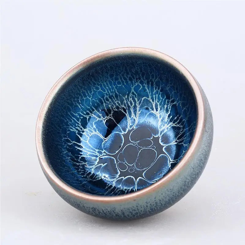 Blue glazed ceramic teacup from Jellyfish, perfect as a tenmoku jian zhan or zhan tea bowl