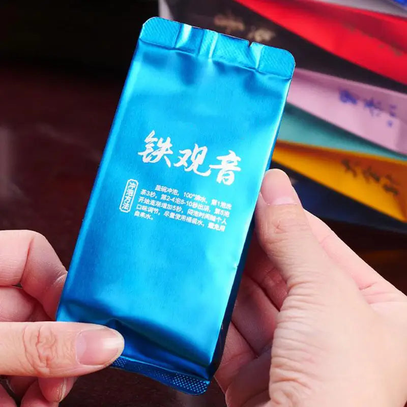 Blue tea packet from Jin Jun Mei Jasmine Tea Cinnamon Black Tea Rock Tea product for tea lovers