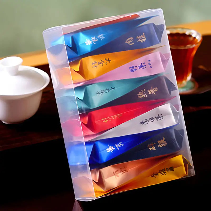 Colorful tea sample box for Jin Jun Mei Jasmine Tea Cinnamon Black Tea Rock Tea featuring tea sets