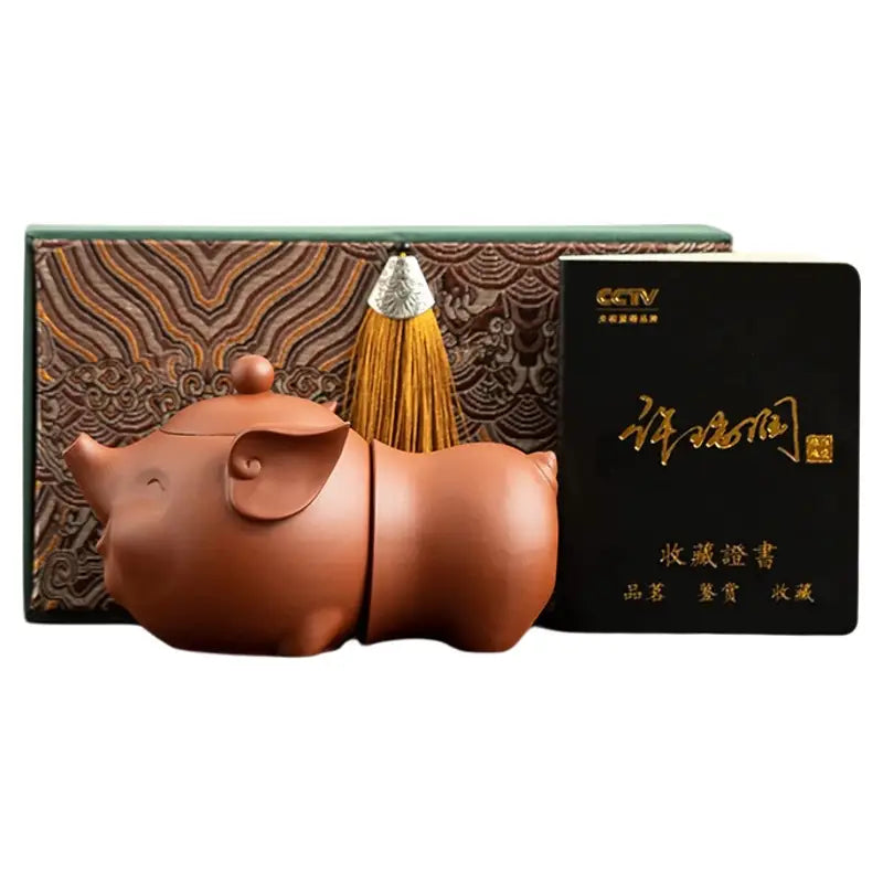 Joyful Piglet Yixing Zisha teapot set with tassel in box, charming pig-shaped design